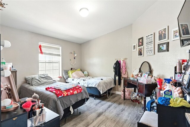 3595 Buchanan St, Riverside, CA 92503 - bedroom with wood finished floors and baseboards