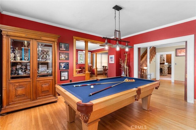 337 S Center St, Redlands, CA 92373 - rec room with billiards, light wood-style floors, crown molding, decorative columns, and baseboards