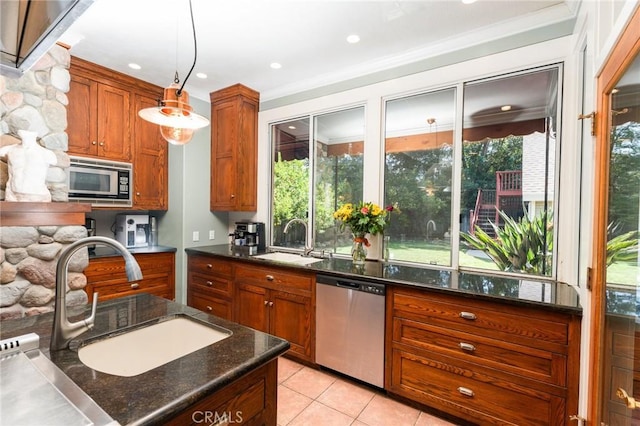 337 S Center St, Redlands, CA 92373 - kitchen featuring appliances with stainless steel finishes, a sink, decorative light fixtures, dark stone countertops, and recessed lighting