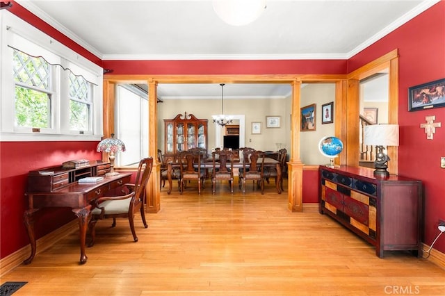 337 S Center St, Redlands, CA 92373 - dining room with light wood-style floors, a chandelier, crown molding, and baseboards