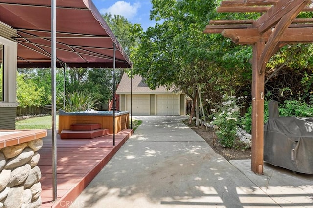 337 S Center St, Redlands, CA 92373 - exterior space with a hot tub and an outdoor structure