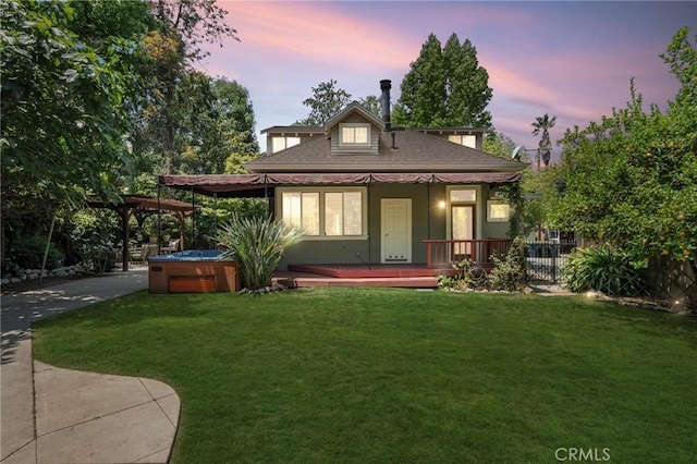 337 S Center St, Redlands, CA 92373 - view of front facade featuring a hot tub and roof with shingles