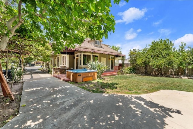337 S Center St, Redlands, CA 92373 - view of front facade with a hot tub and a patio area
