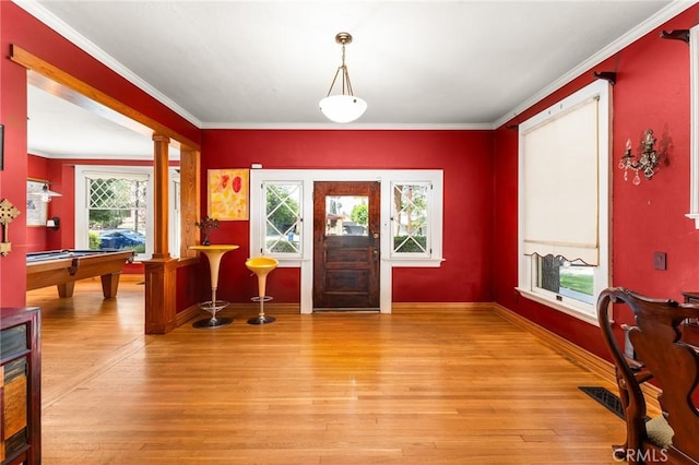 337 S Center St, Redlands, CA 92373 - foyer with decorative columns, light wood-type flooring, crown molding, billiards, and baseboards