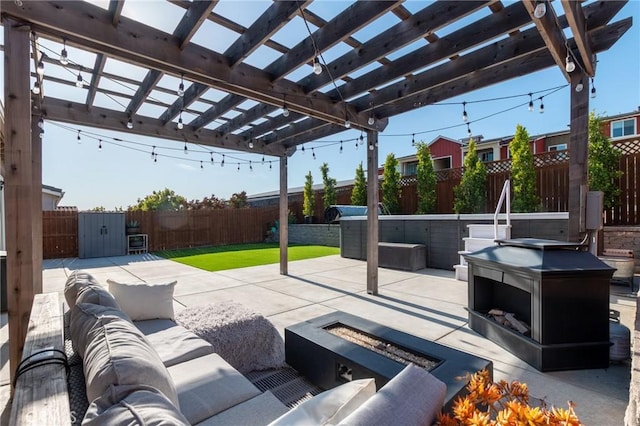 1053 Shultz Ln, Santa Maria, CA 93455 - fenced backyard featuring an outdoor living space with a fire pit and a patio