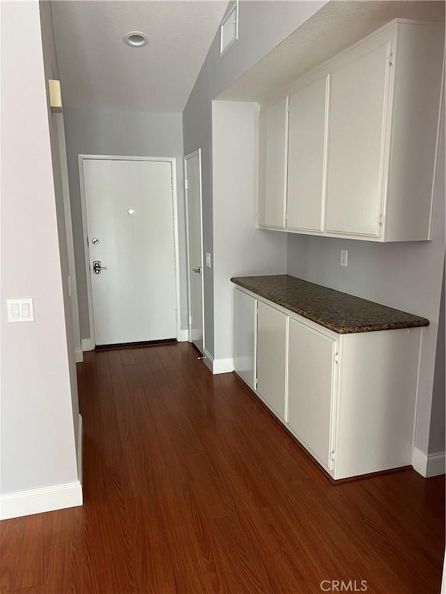 30902 Clubhouse Dr Unit 27H, Laguna Niguel, CA 92677 - hall with baseboards and dark wood-type flooring