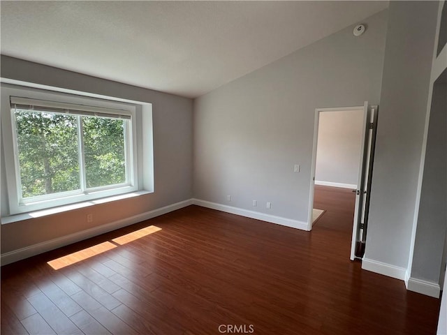 30902 Clubhouse Dr Unit 27H, Laguna Niguel, CA 92677 - spare room with dark wood-style floors, baseboards, and a smoke detector