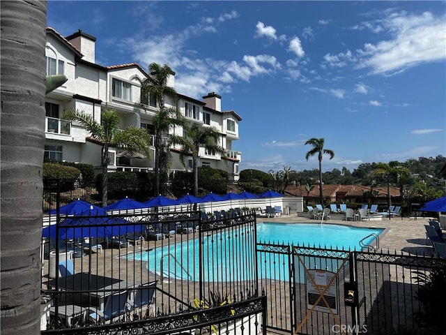 30902 Clubhouse Dr Unit 27H, Laguna Niguel, CA 92677 - community pool with a patio area