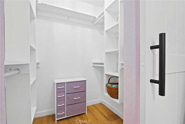 1247 W 17th St, San Pedro, CA 90731 - spacious closet featuring wood finished floors
