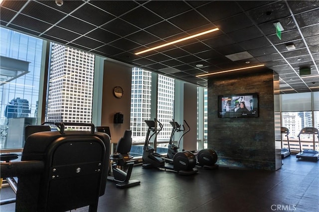 877 Francisco St Unit 1512, Los Angeles, CA 90017 - gym with floor to ceiling windows, plenty of natural light, and a view of city