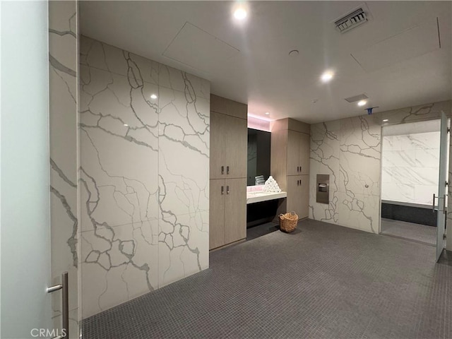 877 Francisco St Unit 1512, Los Angeles, CA 90017 - finished below grade area featuring dark carpet and recessed lighting