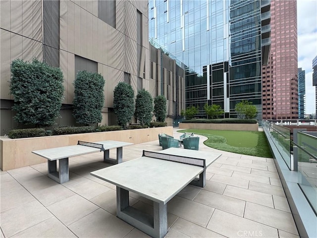 877 Francisco St Unit 1512, Los Angeles, CA 90017 - view of home's community featuring a putting area, a patio area, and a view of city