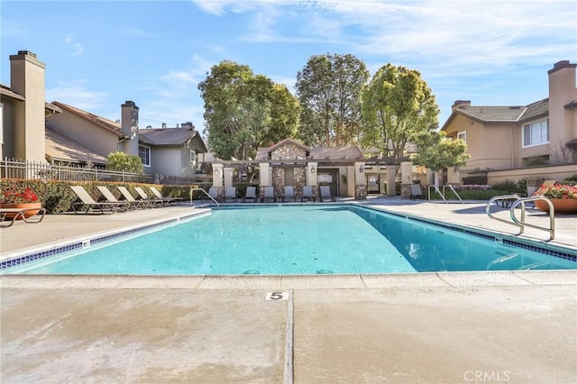 8039 E Snapdragon Ln, Anaheim, CA 92808 - community pool featuring a patio area