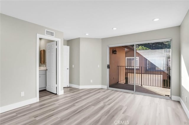 8039 E Snapdragon Ln, Anaheim, CA 92808 - spare room with wood finished floors, baseboards, and recessed lighting