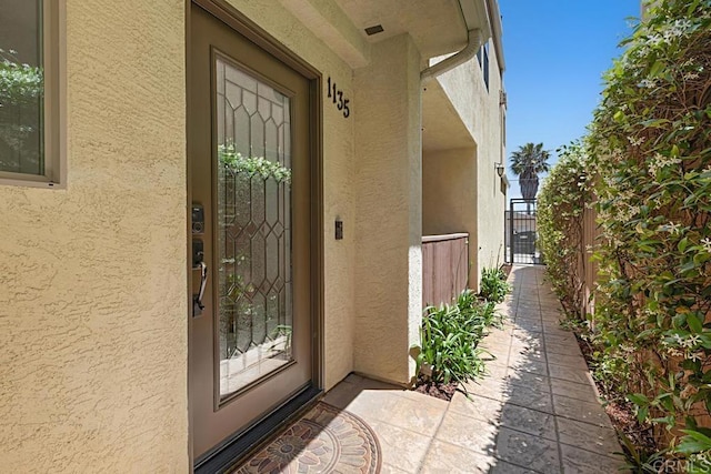 1135 Felspar St, Pacific Beach San Diego, CA 92109 - doorway to property featuring stucco siding