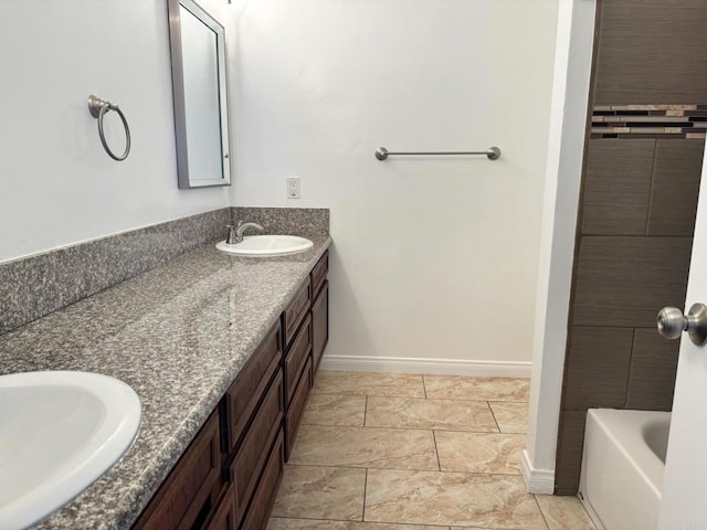 1103 Manzana Way, San Diego, CA 92139 - bathroom featuring double vanity and baseboards
