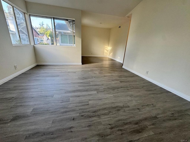 1103 Manzana Way, San Diego, CA 92139 - empty room featuring dark wood finished floors and baseboards