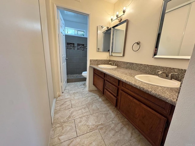 1103 Manzana Way, San Diego, CA 92139 - bathroom with double vanity, marble look tiles, and tiled shower
