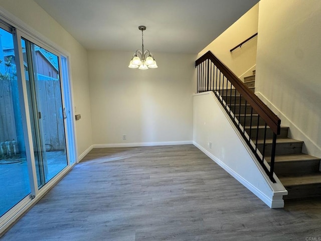 1103 Manzana Way, San Diego, CA 92139 - stairway with wood finished floors and a chandelier