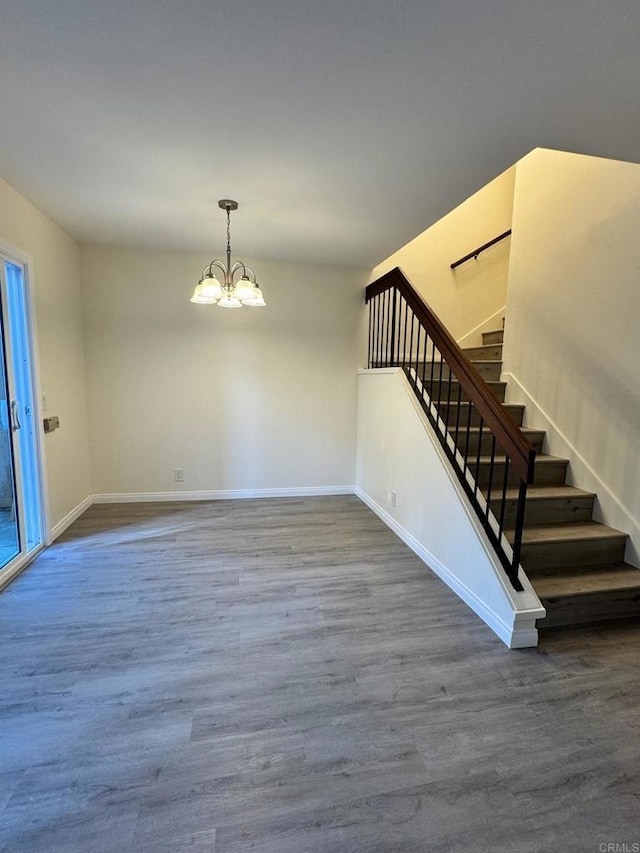 1103 Manzana Way, San Diego, CA 92139 - stairs with wood finished floors and a chandelier