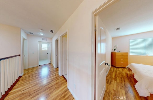 25664 Red Hawk Rd, Corona, CA 92883 - hall featuring plenty of natural light, light wood-style floors, and baseboards