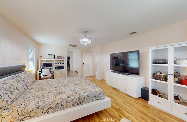 25664 Red Hawk Rd, Corona, CA 92883 - bedroom with light wood-style flooring