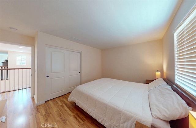 25664 Red Hawk Rd, Corona, CA 92883 - bedroom featuring light wood-style floors