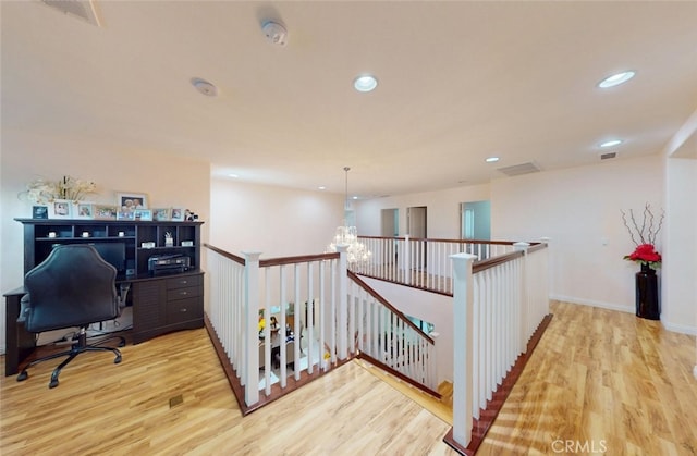 25664 Red Hawk Rd, Corona, CA 92883 - office area featuring wood finished floors, recessed lighting, and a chandelier