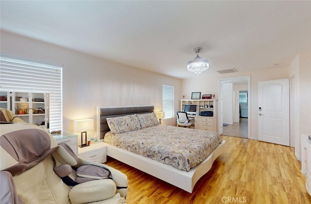 25664 Red Hawk Rd, Corona, CA 92883 - bedroom with light wood-style floors