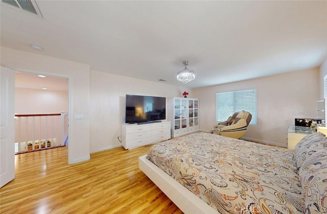 25664 Red Hawk Rd, Corona, CA 92883 - bedroom featuring wood finished floors, baseboards, and multiple windows