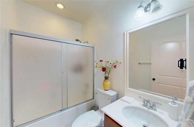 25664 Red Hawk Rd, Corona, CA 92883 - full bath featuring vanity, toilet, combined bath / shower with glass door, and recessed lighting