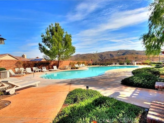 25664 Red Hawk Rd, Corona, CA 92883 - community pool with a mountain view and a patio