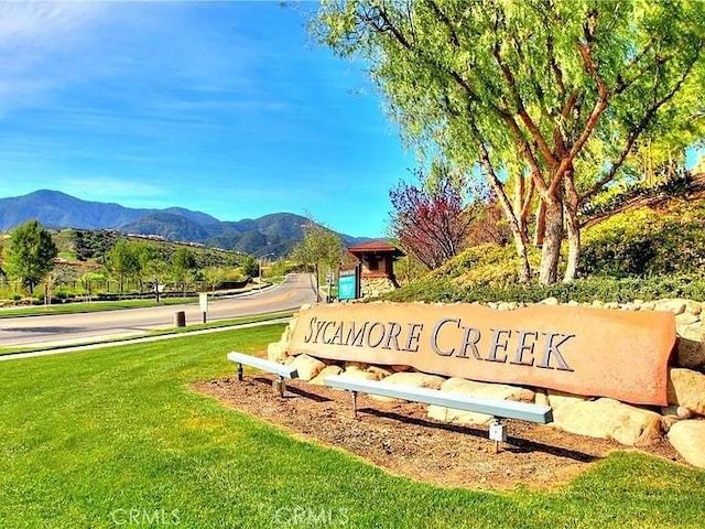 25664 Red Hawk Rd, Corona, CA 92883 - community / neighborhood sign with a mountain view and a yard