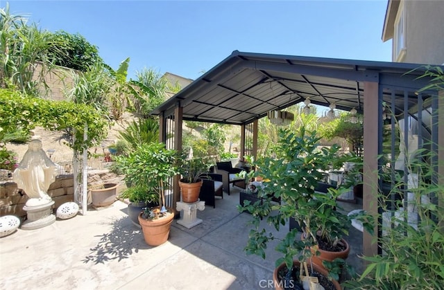 25664 Red Hawk Rd, Corona, CA 92883 - view of patio with a gazebo and an outdoor hangout area