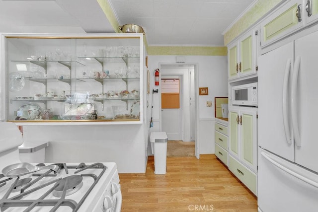 900 W 37th St, San Pedro, CA 90731 - kitchen featuring white appliances, light wood-type flooring, and ornamental molding
