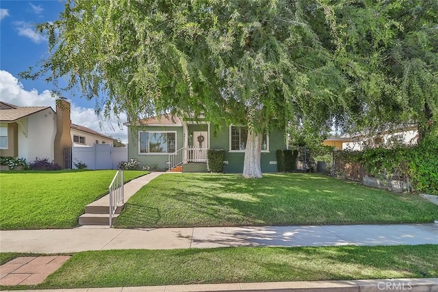 3411 W Chandler Blvd, Burbank, CA 91505 - view of front of house with stucco siding and a chimney