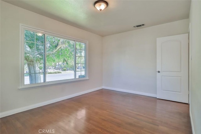 3411 W Chandler Blvd, Burbank, CA 91505 - unfurnished room featuring wood finished floors and baseboards
