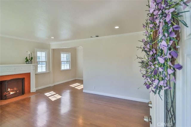 3411 W Chandler Blvd, Burbank, CA 91505 - unfurnished living room featuring crown molding, a lit fireplace, baseboards, wood finished floors, and recessed lighting