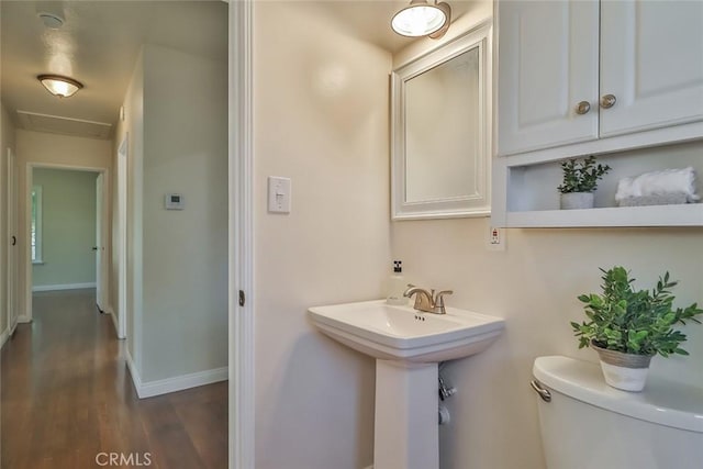 3411 W Chandler Blvd, Burbank, CA 91505 - bathroom with toilet, wood finished floors, and baseboards