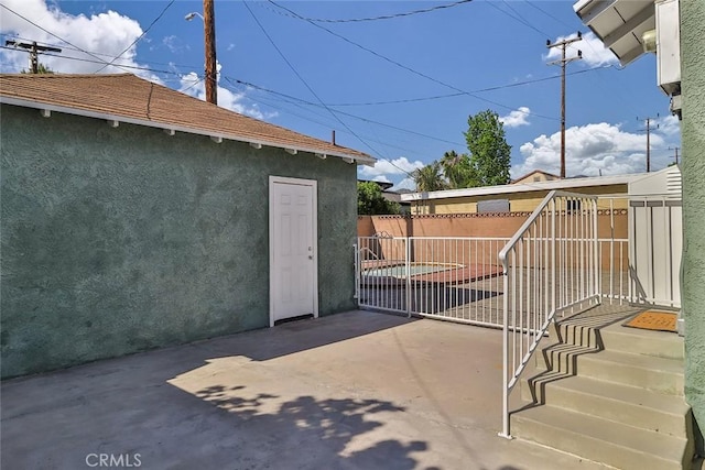 3411 W Chandler Blvd, Burbank, CA 91505 - gate featuring a patio