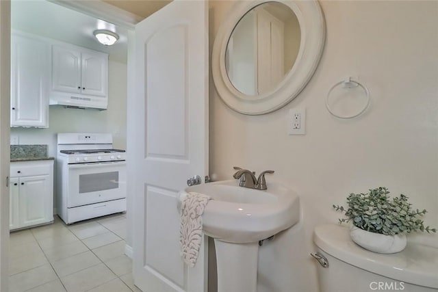 3411 W Chandler Blvd, Burbank, CA 91505 - bathroom featuring toilet, tile patterned floors, and a sink