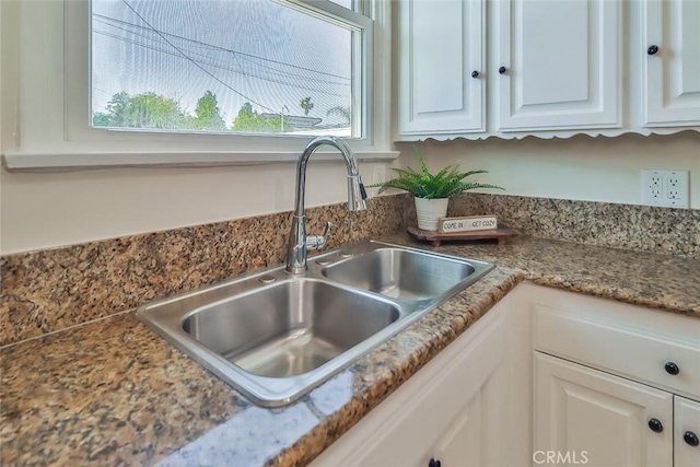 3411 W Chandler Blvd, Burbank, CA 91505 - kitchen view of a sink and white cabinetry