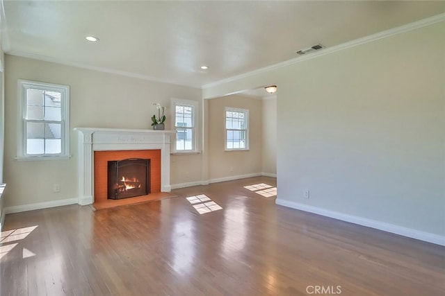 3411 W Chandler Blvd, Burbank, CA 91505 - unfurnished living room featuring crown molding, baseboards, a fireplace with flush hearth, wood finished floors, and recessed lighting