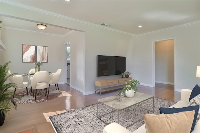 3411 W Chandler Blvd, Burbank, CA 91505 - living room with wood finished floors, baseboards, ornamental molding, and recessed lighting
