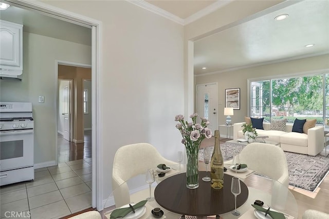 3411 W Chandler Blvd, Burbank, CA 91505 - dining room with baseboards, light tile patterned floors, ornamental molding, and recessed lighting