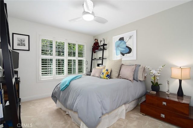 20950 Oxnard St Unit 11, Woodland Hills, CA 91367 - bedroom featuring light colored carpet, baseboards, and a ceiling fan