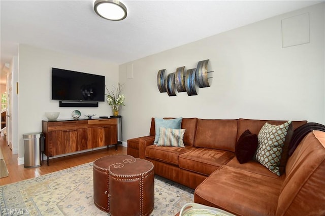 20950 Oxnard St Unit 11, Woodland Hills, CA 91367 - living area featuring wood finished floors and baseboards