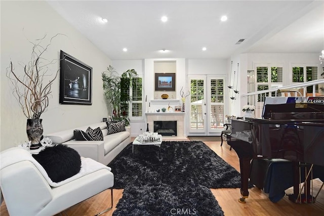 20950 Oxnard St Unit 11, Woodland Hills, CA 91367 - living area with a fireplace, wood finished floors, and recessed lighting