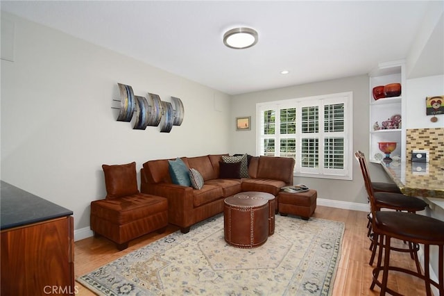 20950 Oxnard St Unit 11, Woodland Hills, CA 91367 - living area featuring light wood finished floors, baseboards, and recessed lighting