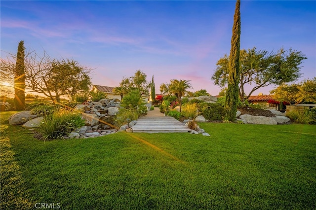 39190 Corte Venture, Temecula, CA 92592 - yard at dusk featuring a lawn